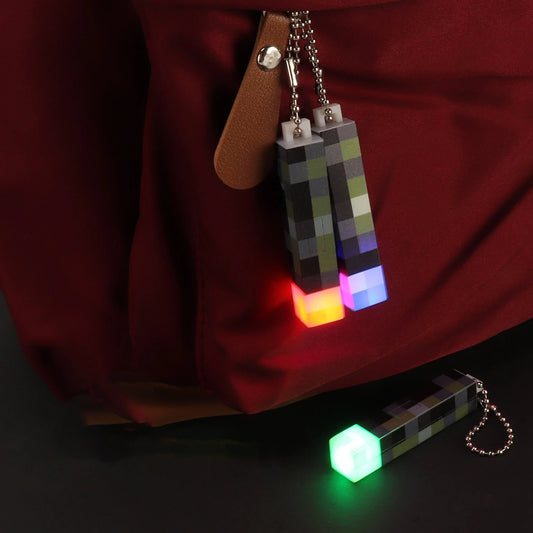 Pixel Wind Mini Torch – USB-rechargeable LED keychain, perfect as a night light, backpack pendant, or fun collectible