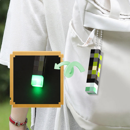 Pixel Wind Mini Torch – USB-rechargeable LED keychain, perfect as a night light, backpack pendant, or fun collectible